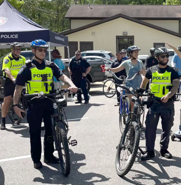 Image of police officers with e-bikes.